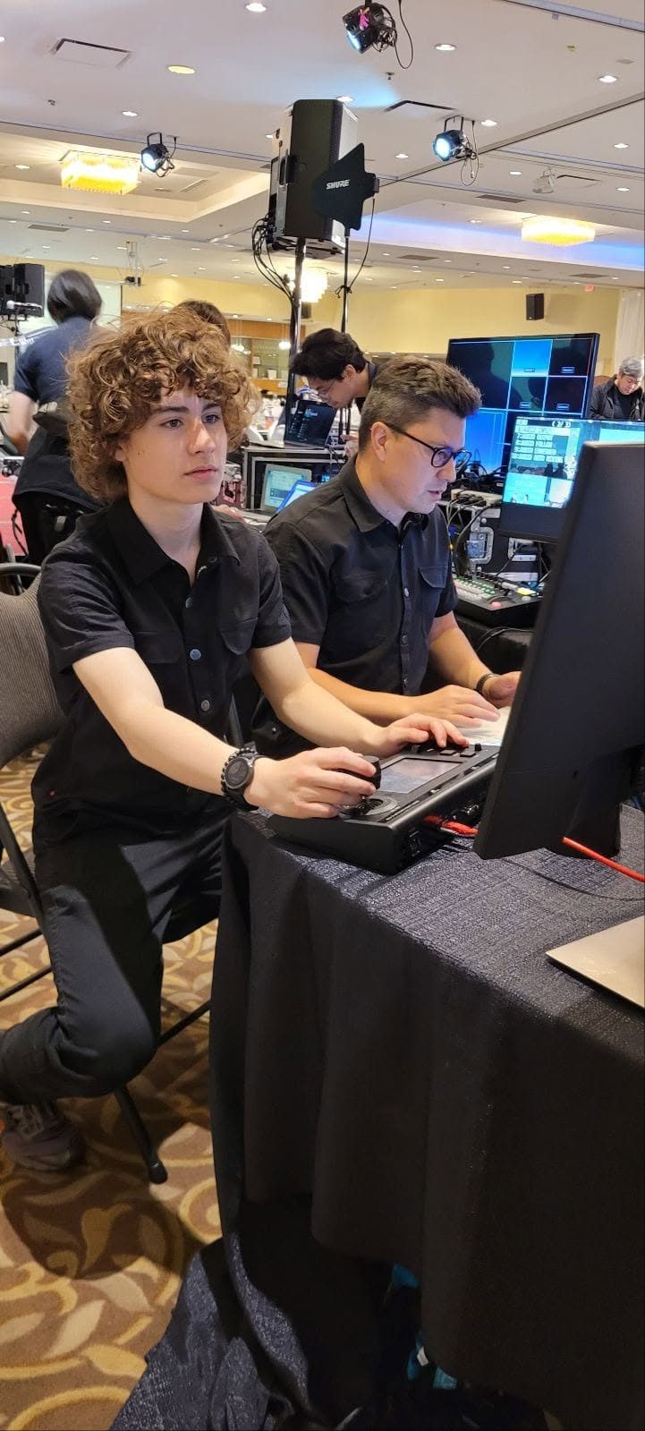 Andrew at the AV production desk