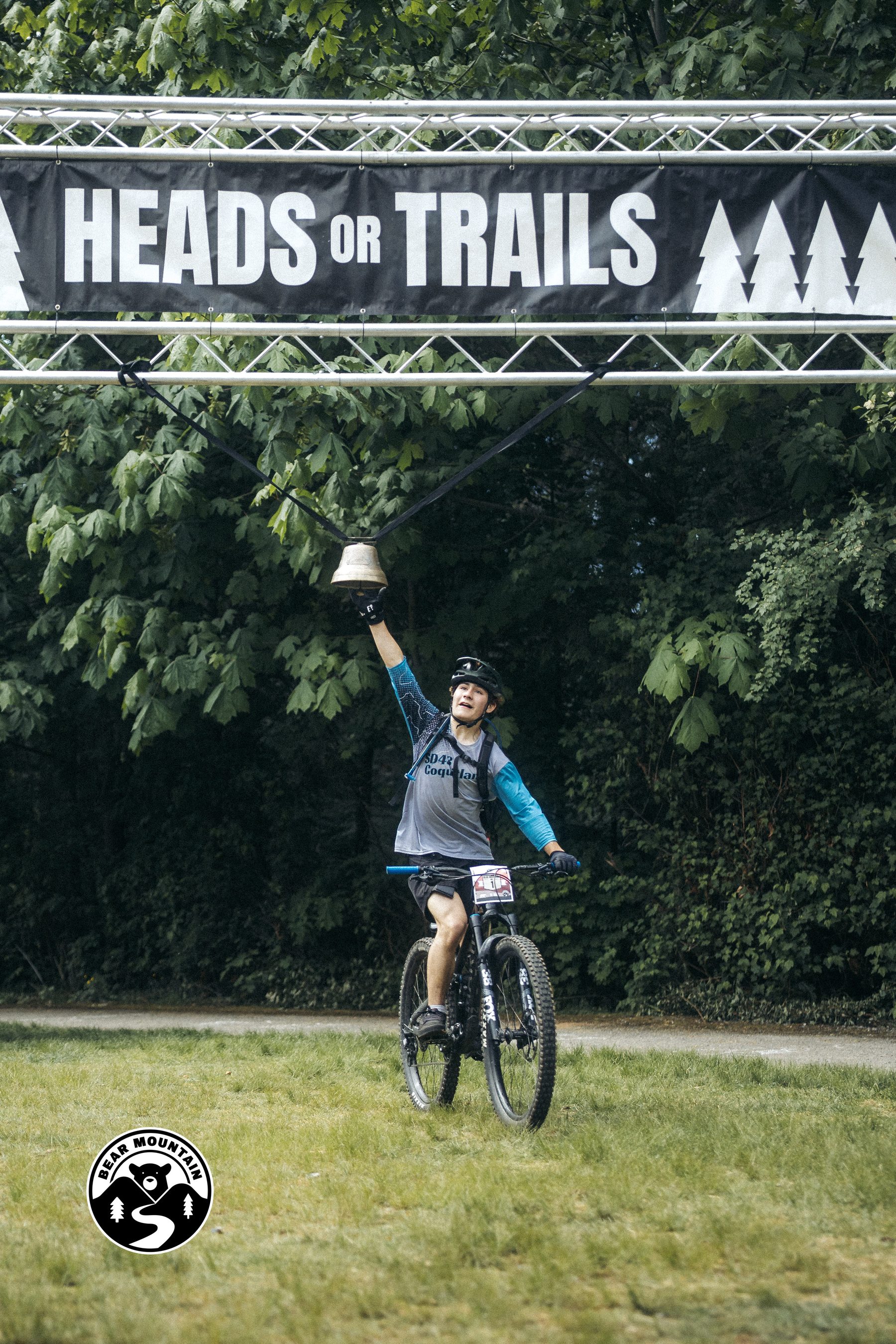 Andrew ringing the finish bell at Bear Mountain